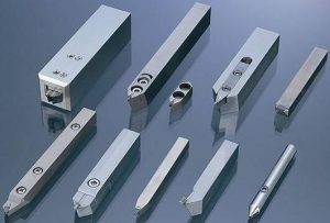 What is tool compensation in precision part machining